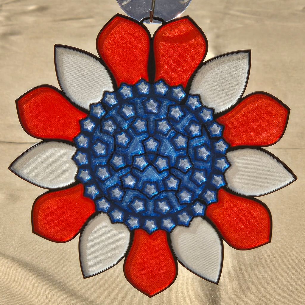 A circular decorative ornament or medallion with a red and white petal-like border surrounding a blue star-patterned center, shown against a light beige background.